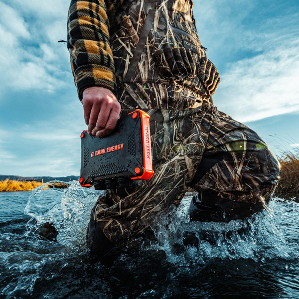 Dark Energy Poseidon XL Power Bank showing multiple USB ports and digital display, portable device for charging on the go.