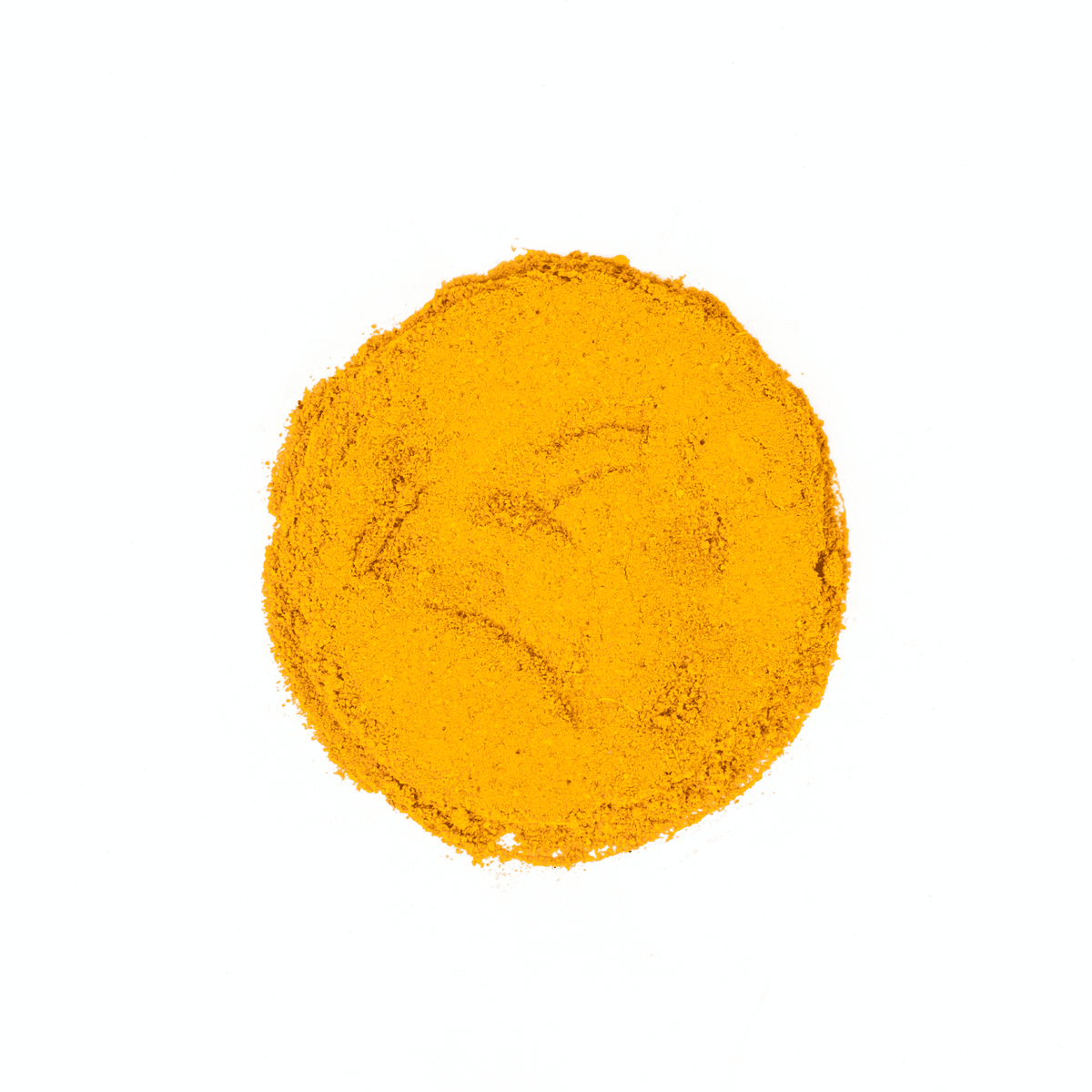 Organic Golden Milk blend by Nepal Tea in a glass cup with a golden hue, showcasing a warm and inviting beverage.