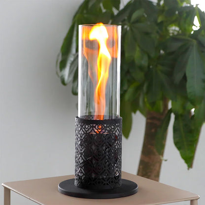 Outdoor table-top gel and ethanol fireplace by JHY DESIGN featuring a spiral flame design on a sleek fire pit.