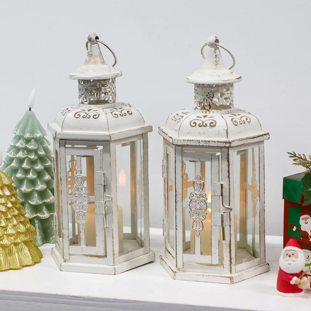 Set of two 10-inch vintage-style outdoor decorative candle lanterns by JHY DESIGN, featuring intricate metalwork and glass panels.