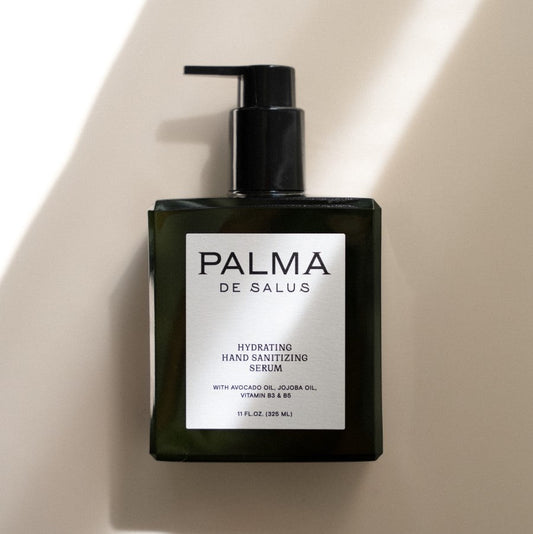 Palma de Salus hydrating hand sanitizing serum in an 11oz bottle, moisturizing hand serum for clean, soft hands.