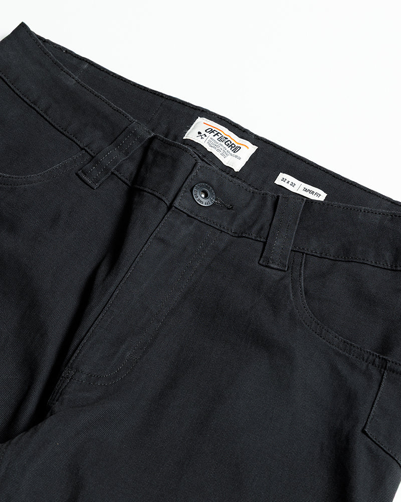 Off The Grid Surplus Trailblazer Taper Fit Pants in vintage black, showing the slim-fit design and durable fabric.