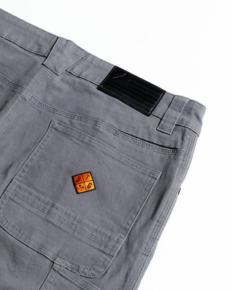 Off The Grid Surplus Trailblazer Taper Fit Pants in Castlerock grey, showing the tapered design and fabric texture.