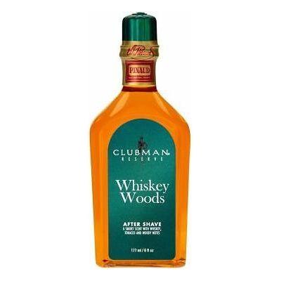 Clubman Reserve Whiskey Woods after shave in a 6 oz bottle with a dark, textured label and a screw-top cap.