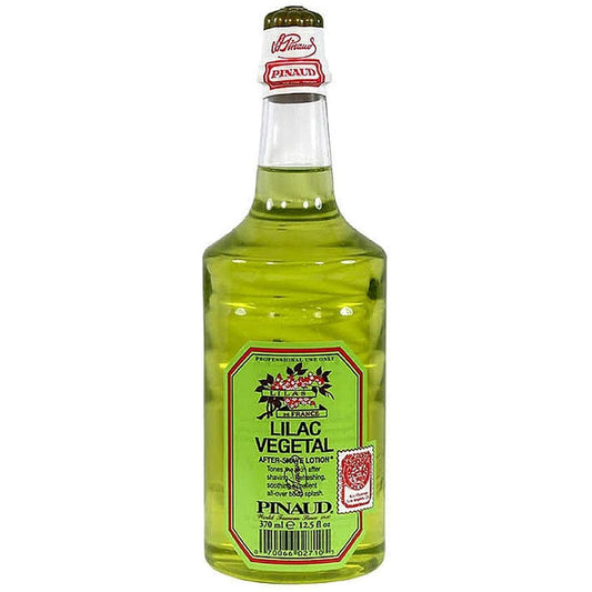 Pinaud Clubman Lilac Vegetal after-shave lotion in a 12.5 oz bottle, featuring vintage-style packaging and branding.