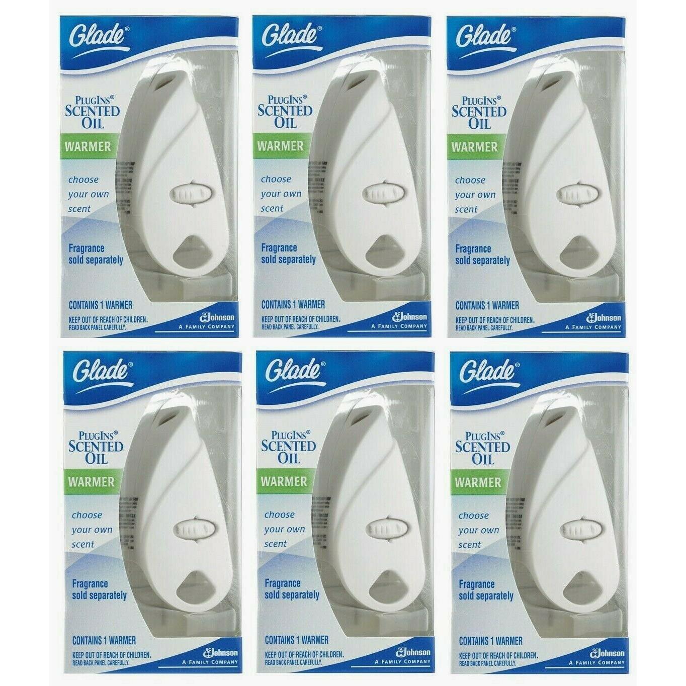 Glade Plug Ins scented oil warmer pack for air freshening, with a sleek plastic design and refillable oil container.