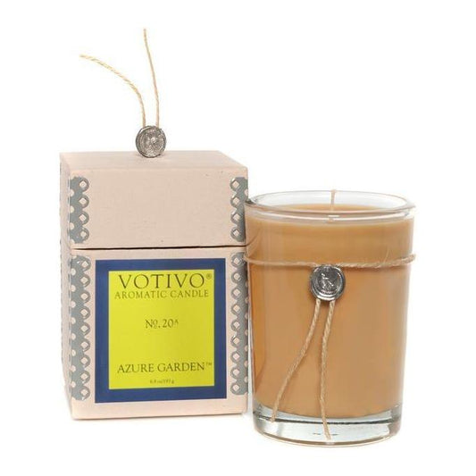 Votivo Azure Garden Aromatic Candle in 6.8oz glass jar, featuring a serene blue design and floral scent, by Pasteur Pharmacy.