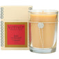 Votivo Aromatic Candle in Red Currant scent, 6.8oz, with a lit wick and red-colored wax in a glass container.