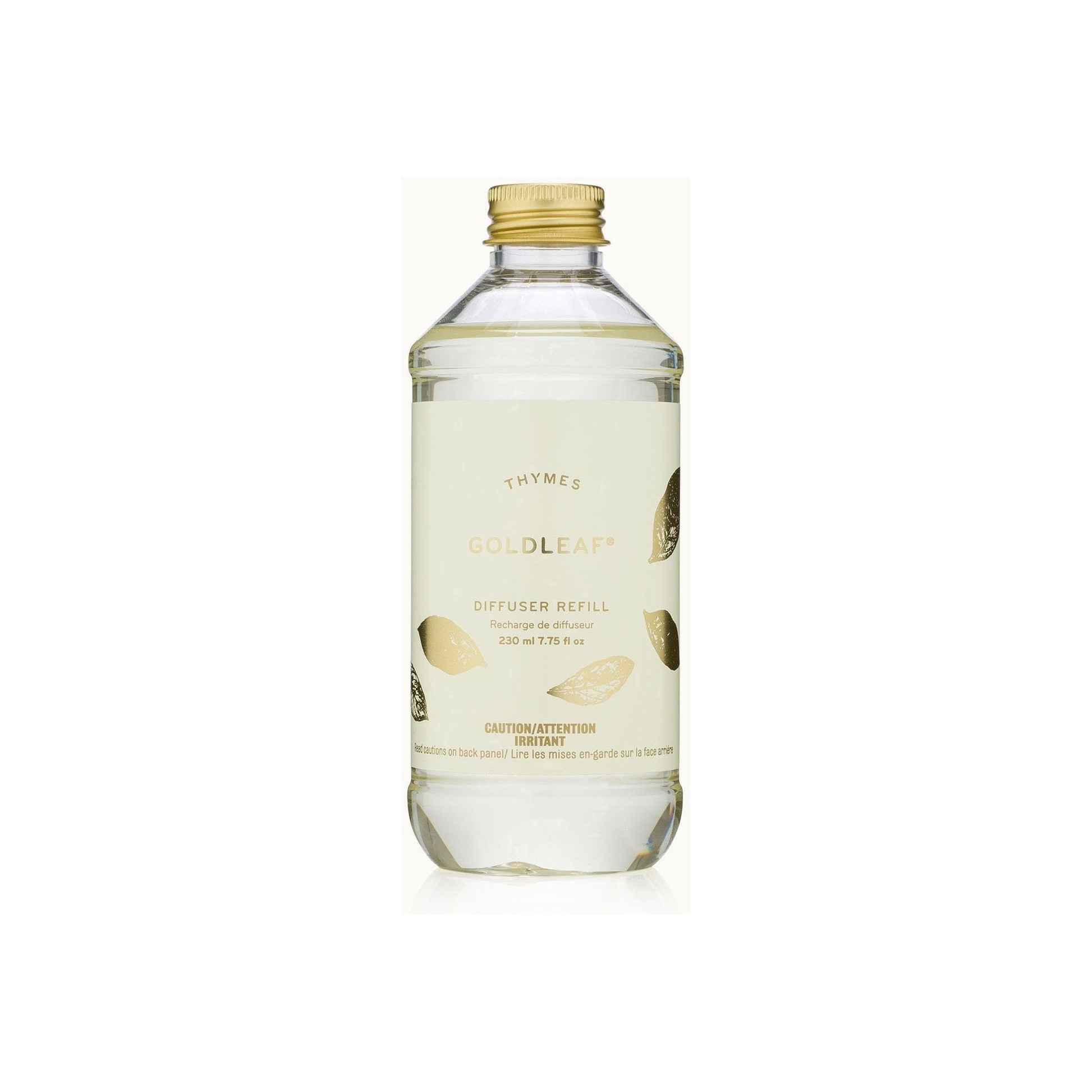 Thymes Goldleaf Aromatic Diffuser in a 7.75 oz glass bottle with reed sticks, designed to add a luxurious scent to any space.