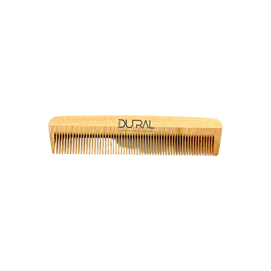 Baby comb made of Dural Beech wood from Pasteur Pharmacy, featuring smooth, natural wood with fine teeth for gentle hair grooming.