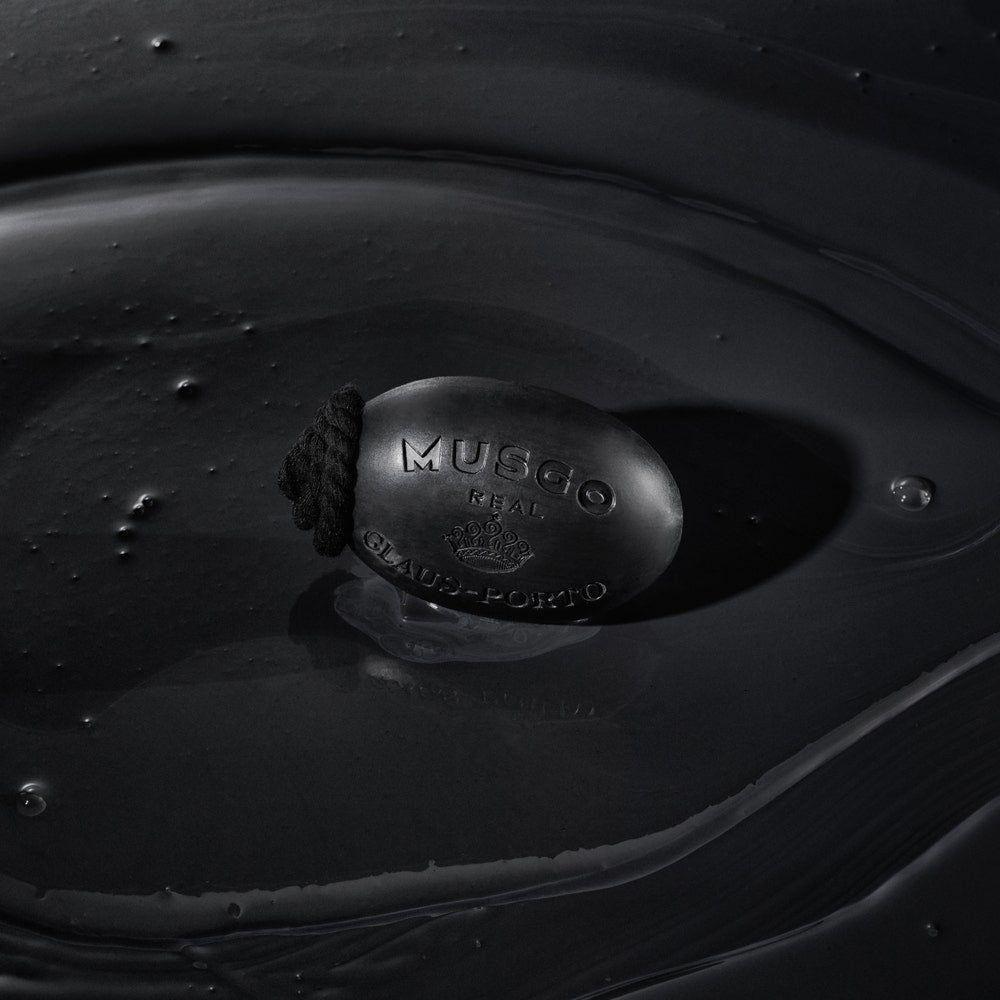 Musgo Real Black Edition soap on a rope by Pasteur Pharmacy, 6.7 oz bar soap with a black design, hanging on a rope.