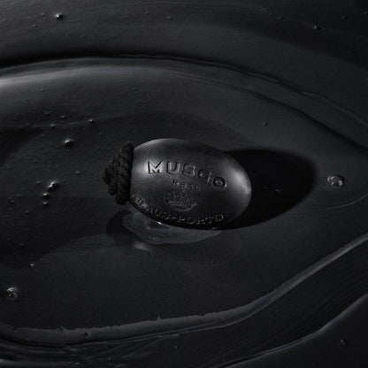 Musgo Real Black Edition soap on a rope by Pasteur Pharmacy, 6.7 oz bar soap with a black design, hanging on a rope.