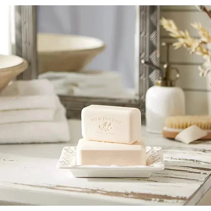 Bar soap with spiced balm scent, enriched with shea butter, in a 250g package from Pre de Provence, shown in the image.