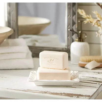 Bar soap with spiced balm scent, enriched with shea butter, in a 250g package from Pre de Provence, shown in the image.