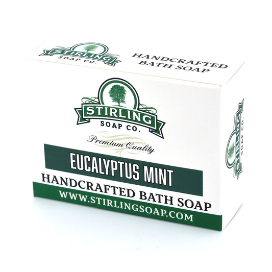Eucalyptus Mint Bath Soap by Stirling Soap Co. in 5.5 oz bar, with fresh eucalyptus and mint scent, displayed on a wooden surface.