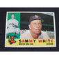 1960 Topps Baseball Card #203 Sammy White Boston Red Sox baseball card with player portrait and team logo.