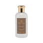 Truefitt & Hill Apsley bath and shower travel cream, 3.38 oz, in a sleek white bottle with elegant branding.