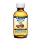 De La Cruz pure cold-pressed argan oil in a 2 fl oz bottle, used for nourishing bath and body skincare.