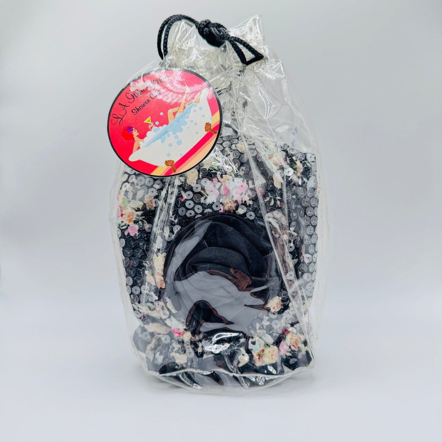 Black reusable shower cap with colorful floral pattern, designed for comfortable bath and body protection.