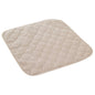 Reusable tan protector pad by Quik Sorb for medical furniture, used in bath and body care settings for hygiene and protection.