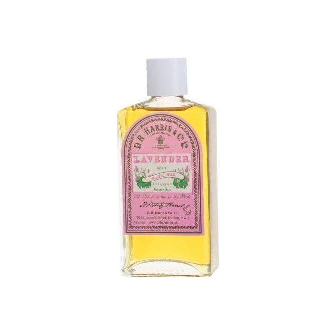 D. R. Harris & Co Lavender Bath Oil 100ml in a clear glass bottle with lavender-colored label, designed for a relaxing bath experience.
