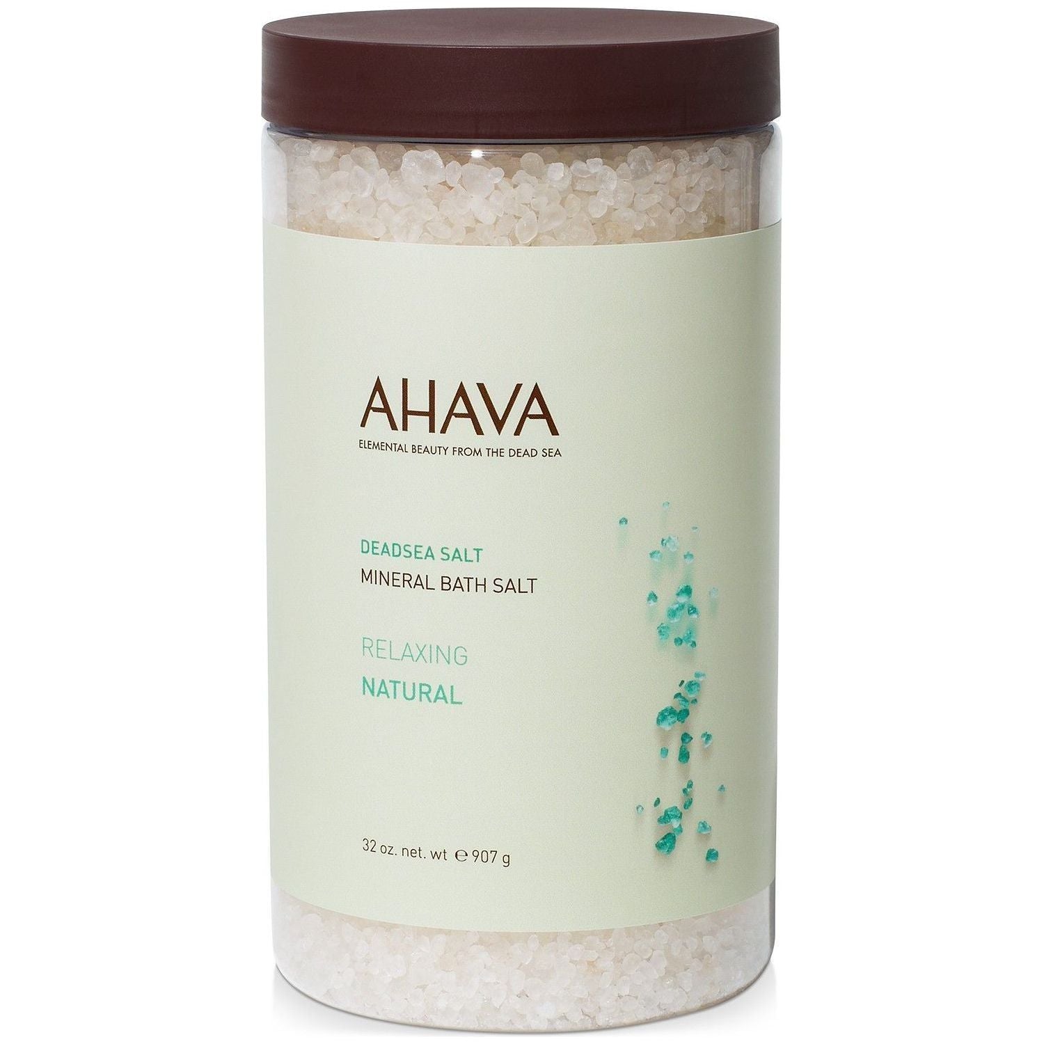 Natural Ahava Dead Sea Salt mineral bath salt in a 32 oz jar, featuring coarse white crystals for relaxing bath use.