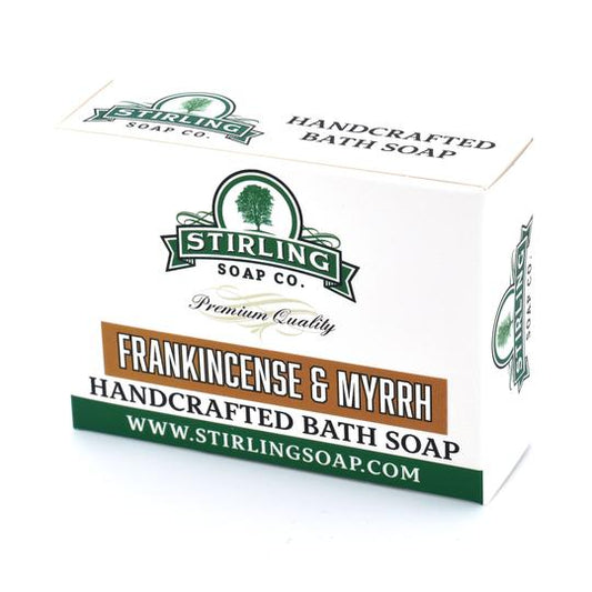 Stirling Soap Co. Frankincense & Myrrh Bath Soap 5.5 oz with embossed label and creamy soap bar, natural and fragrant skincare product.