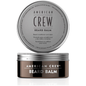 American Crew Beard Balm in a 2.1 oz jar, featuring natural ingredients for conditioning and shaping men's beards.