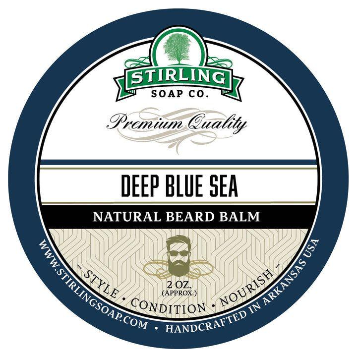 Deep Blue Sea natural beard balm by Stirling Soap Co. in a 2 oz jar, featuring a calming blue label and beard grooming ingredients.