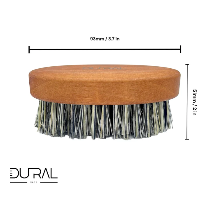 Dural beard brush with grey Tampico fiber bristles and pear wood handle, designed for grooming and styling beards.