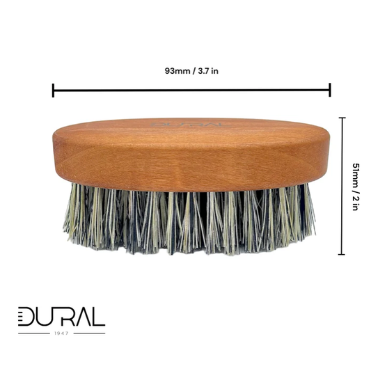 Dural beard brush with grey Tampico fiber bristles and pear wood handle, designed for grooming and styling beards.