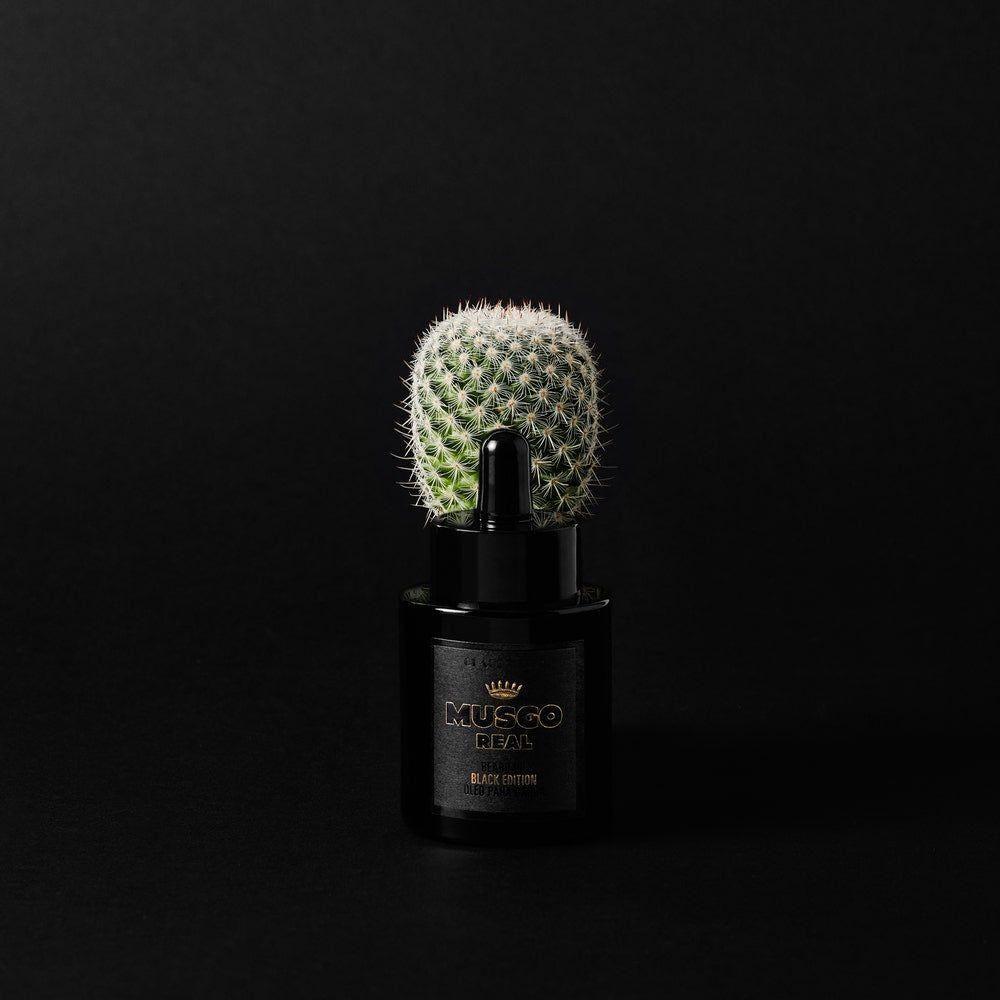 Pasteur Pharmacy Musgo Real Black Edition Beard Oil in 1 fl oz bottle, with a dark packaging and dropper applicator visible.