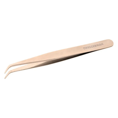 Tweezerman Lash Assist Rose beauty tool shown with pink handle and precision tip for eyelash separation and enhancement.