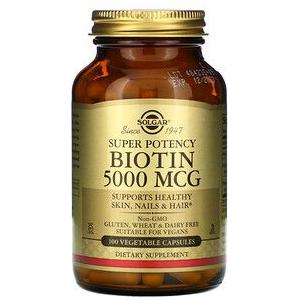 Solgar Biotin 5000 mcg supplement in 100 vegetable capsules, supporting healthy hair, skin, and nails.