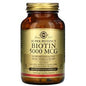 Solgar Biotin 5000 mcg supplement in 100 vegetable capsules, supporting healthy hair, skin, and nails.