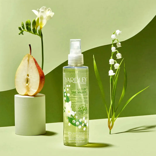 Yardley Lilly of the Valley Body Mist in a 6.8 fl oz spray bottle, featuring floral fragrance and elegant packaging.