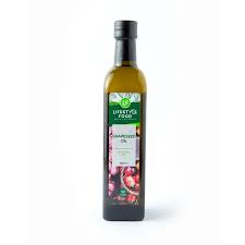 Grapeseed body oil in a 500 mL bottle by Pasteur Pharmacy, smooth and nourishing skincare product in clear container
