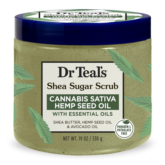 Dr Teal's Cannabis Sativa Hemp Seed Oil Shea Sugar Body Scrub, 19 oz, in a tub showing creamy texture with natural ingredients.