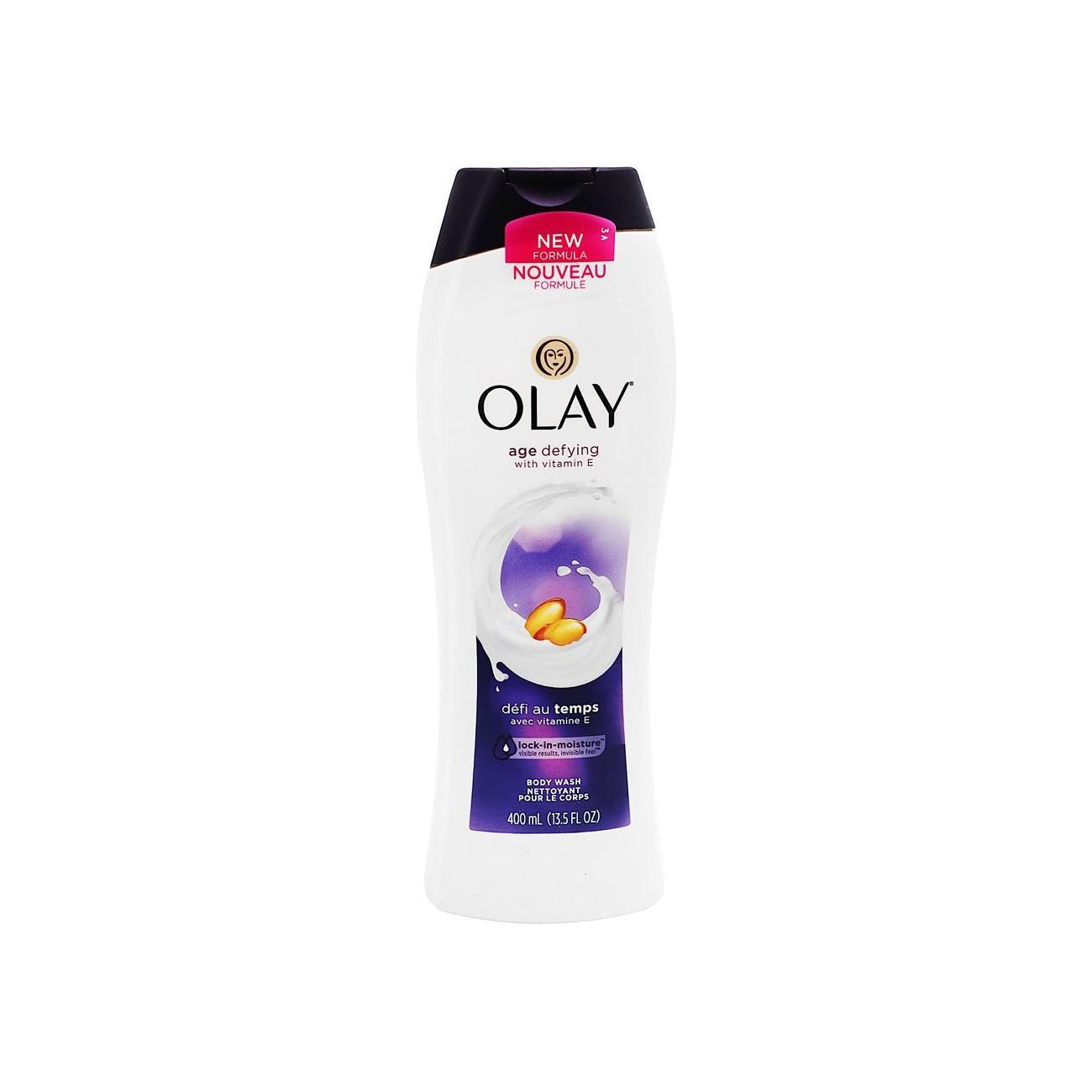 Olay Age Defying Vitamin E Body Wash in 13.5 oz bottle, moisturizing body wash with vitamin E for smooth skin, displayed in a bathroom setting