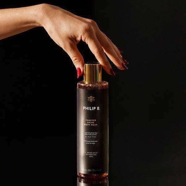 Philip B. Forever Shine Body Wash in 11.8 oz bottle, featuring a sleek design and clear labeling for nourishing skin.