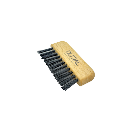 Dural beech wood brush and comb cleaner with nylon bristles, designed for cleaning and maintaining hairbrushes and combs.