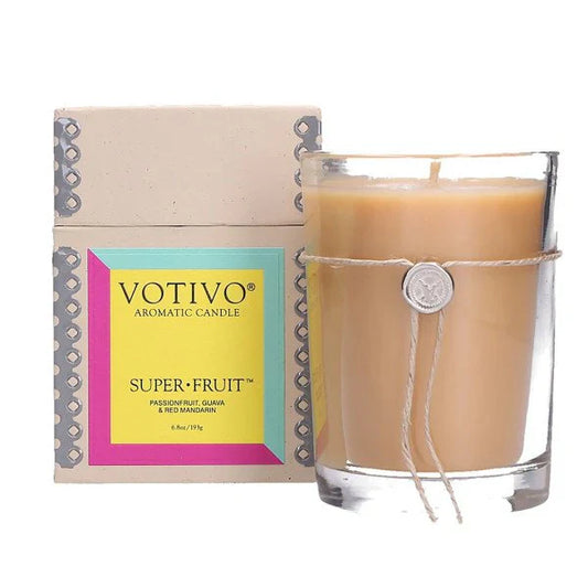 Votivo Super Fruit Candle from Pasteur Pharmacy, scented candle with vibrant fruit-inspired design and warm glow.