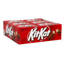 Box of 36 Pasteur Pharmacy Kit Kat Crisp Wafers in Milk Chocolate candy bars, stacked with visible chocolate coating and wafer layers.