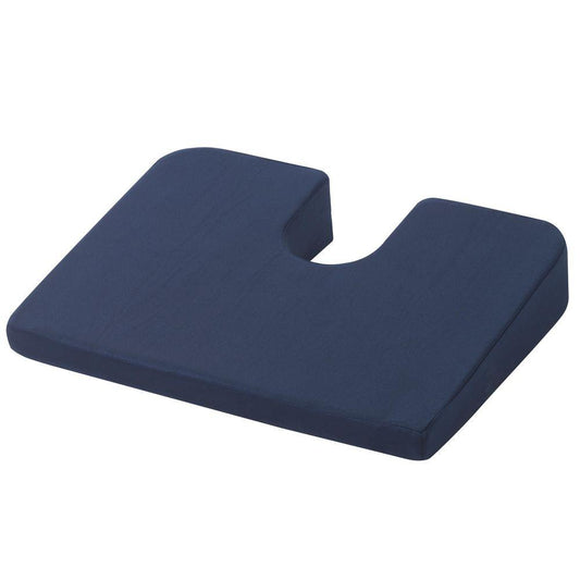 Blue Drive Medical Compressed Coccyx Cushion on chair, ergonomic support cushion for comfort and pressure relief.