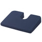 Blue Drive Medical Compressed Coccyx Cushion on chair, ergonomic support cushion for comfort and pressure relief.