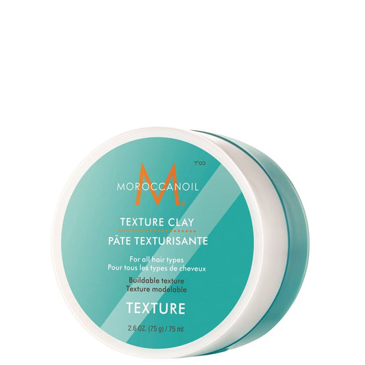 Moroccanoil Texture Clay in 2.6 oz container, natural hair styling clay with matte finish, shown in a jar with a textured surface.