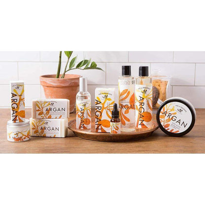 Pre De Provence Argan Sweet Orange Cleansing Oil in a 240ml bottle, featuring a clear bottle with an orange cap and a bright label.