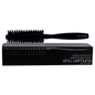 Small round brush by Shu Uemura for unisex, ideal for styling and blow-drying, shown with bristles and handle.