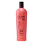 Bain De Terre Shea Butter & Wild Ginger Damage Repair Conditioner in 13.5 fl oz bottle, with conditioner poured into a shower setting