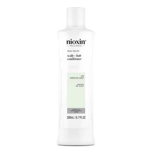 Nioxin Pro Clinical Revitalisant Scalp and Hair Conditioner in 6.7 oz bottle, nourishing scalp and hair for healthier hair.